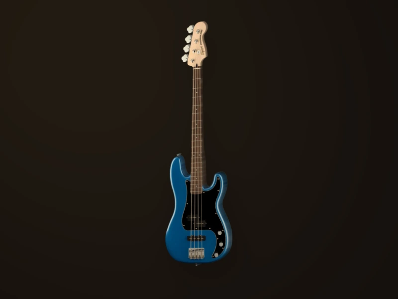 La basse Squier Affinity Precision Bass, finition bleue, posée sur fond sombre